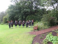 Pipe Band playing in the rain